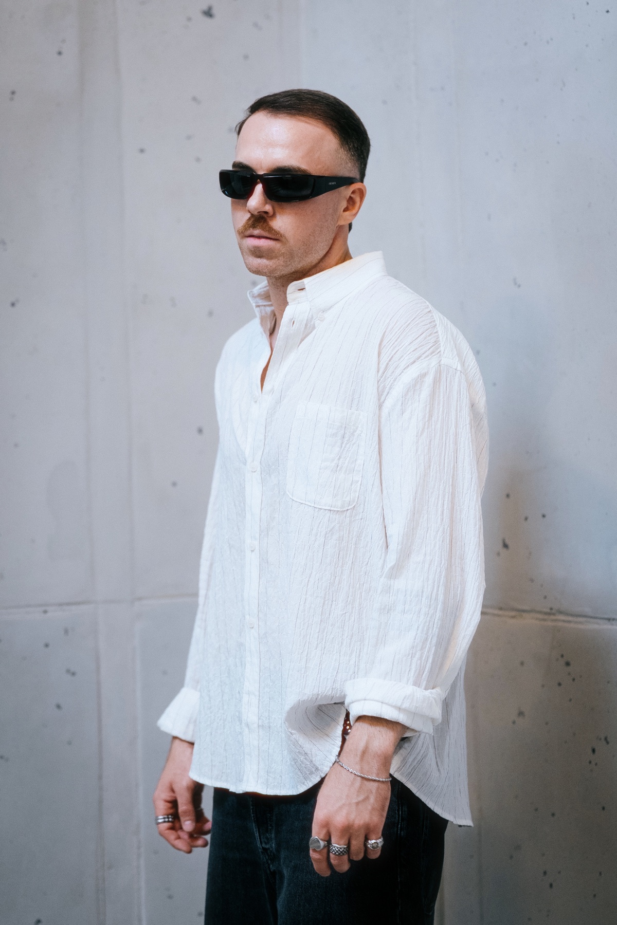 Nik Andersson portrait in a white shirt