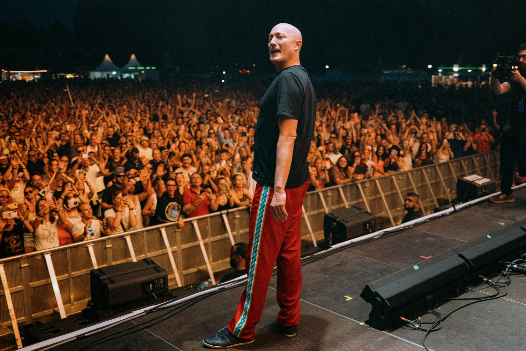 Paul Kalkbrenner on stage in front of the crowd