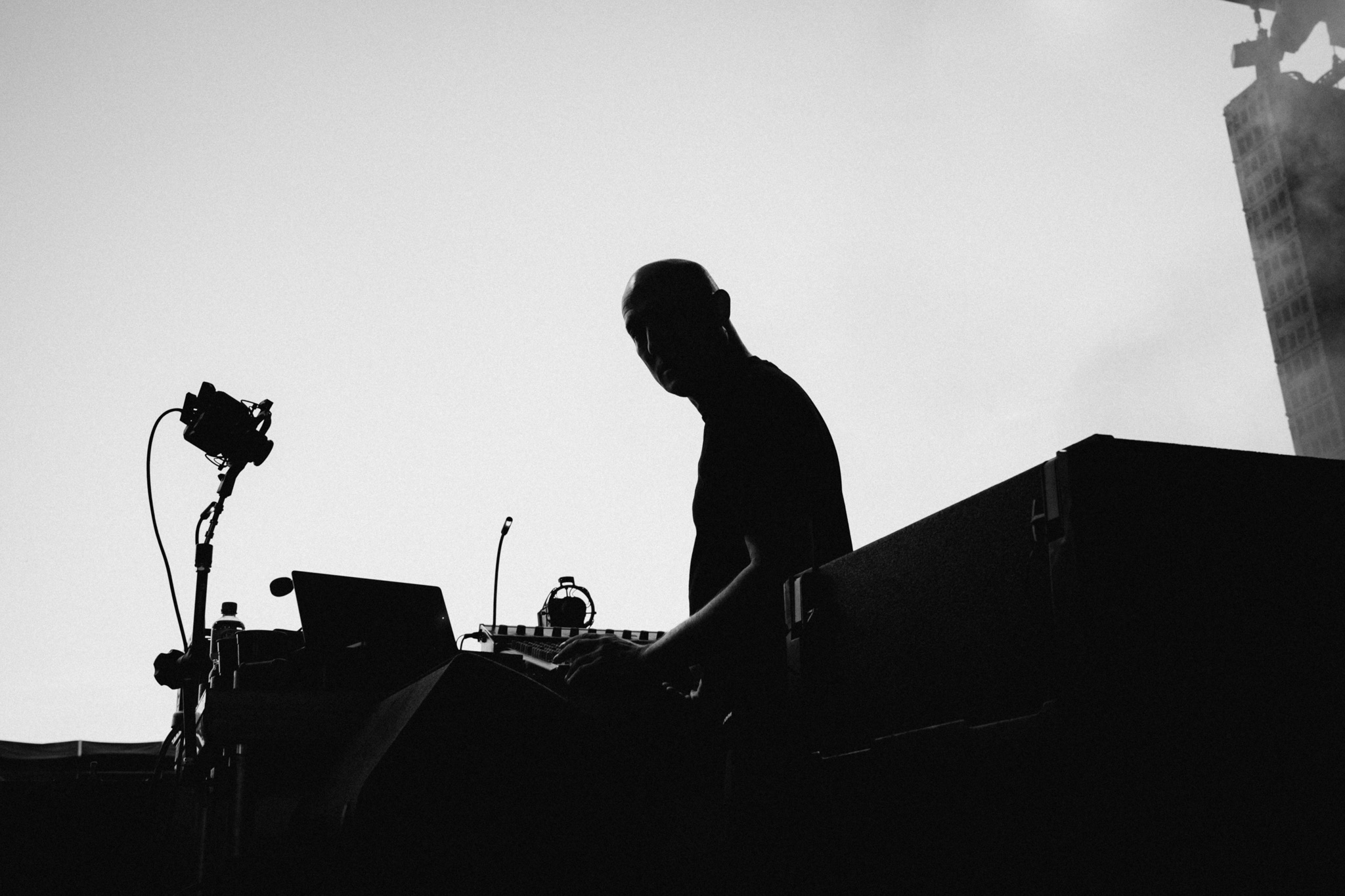 Paul Kalkbrenner in silhouette at the decks